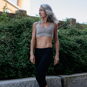 balance bra in clay styled with black capri
