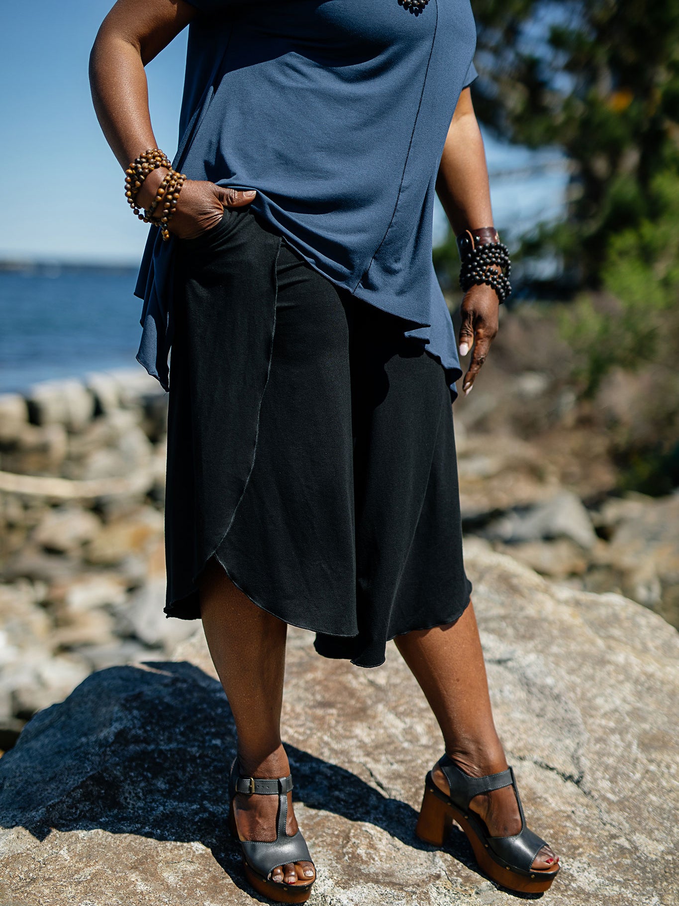 petal pant in black paired with breeze top in navy
