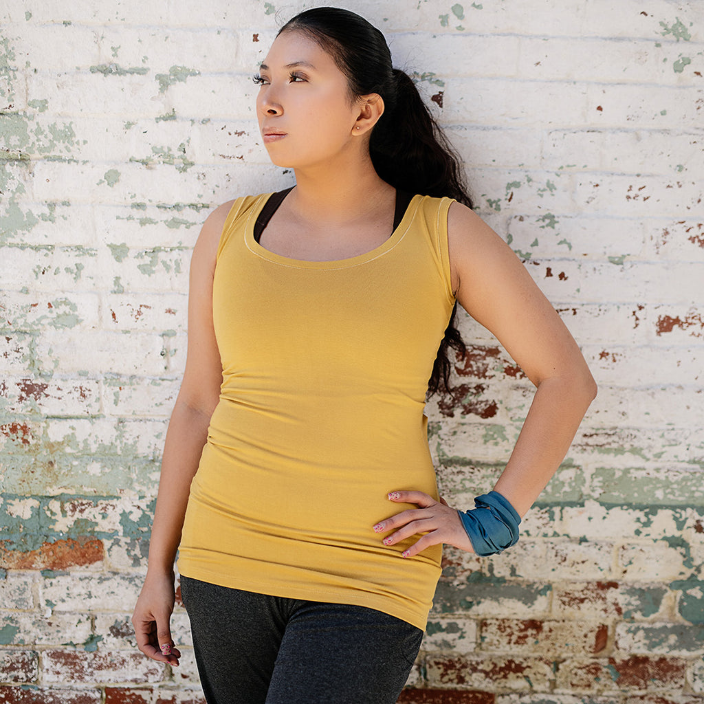 core essential tank in amber with ocean band around wrist