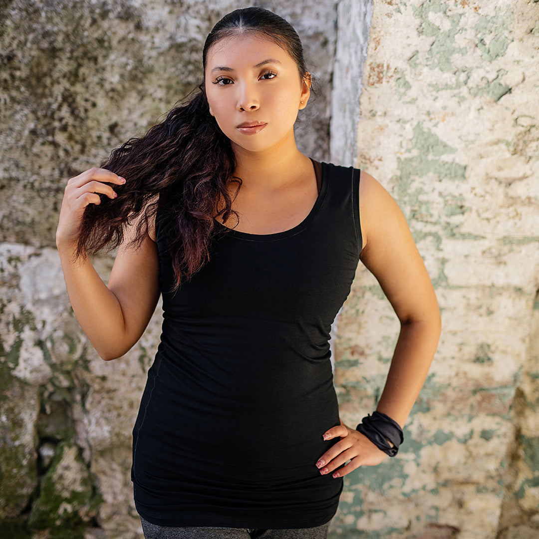 core essential tank in black with carbon band around wrist