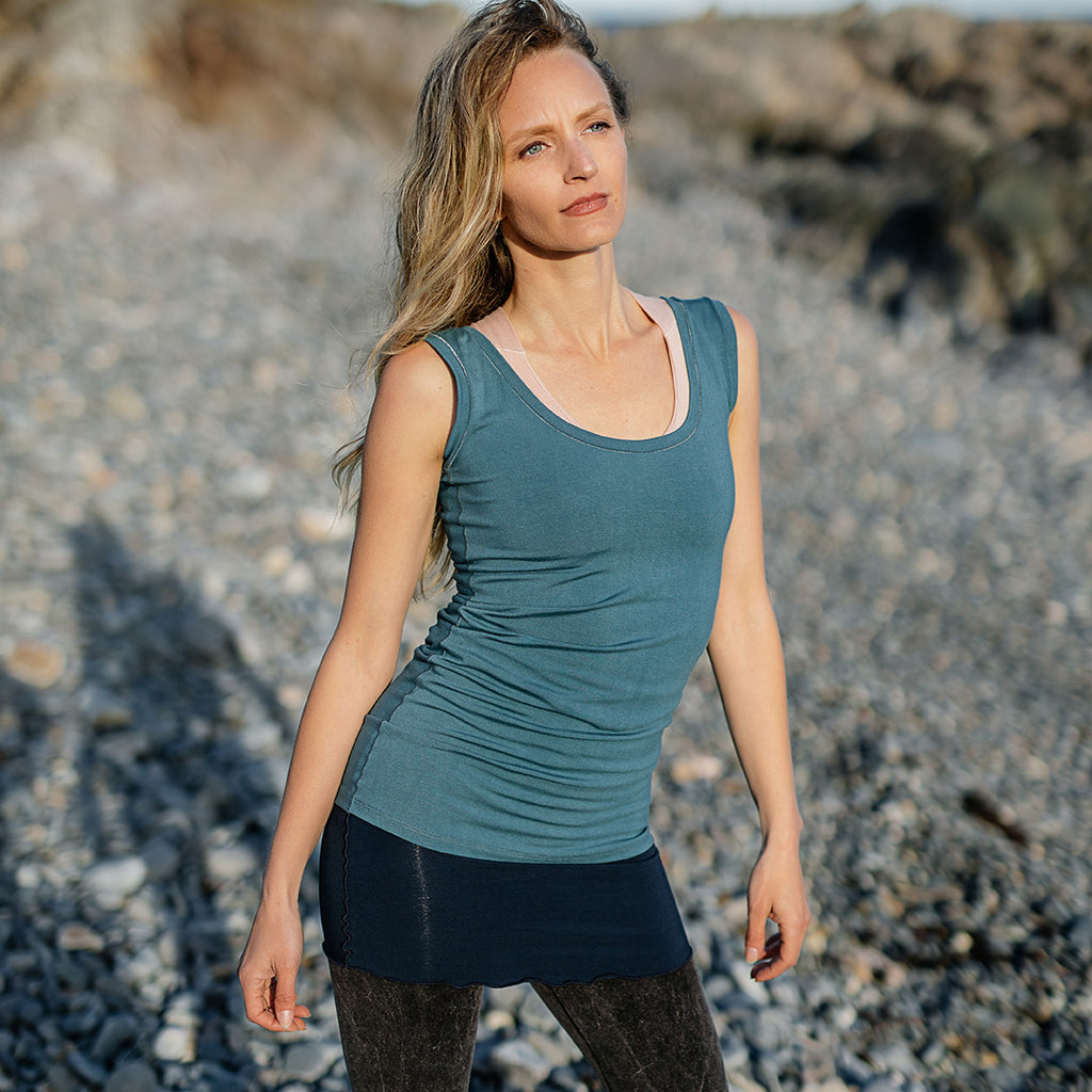 core essential tank in ocean styled with mineral capri + navy corset