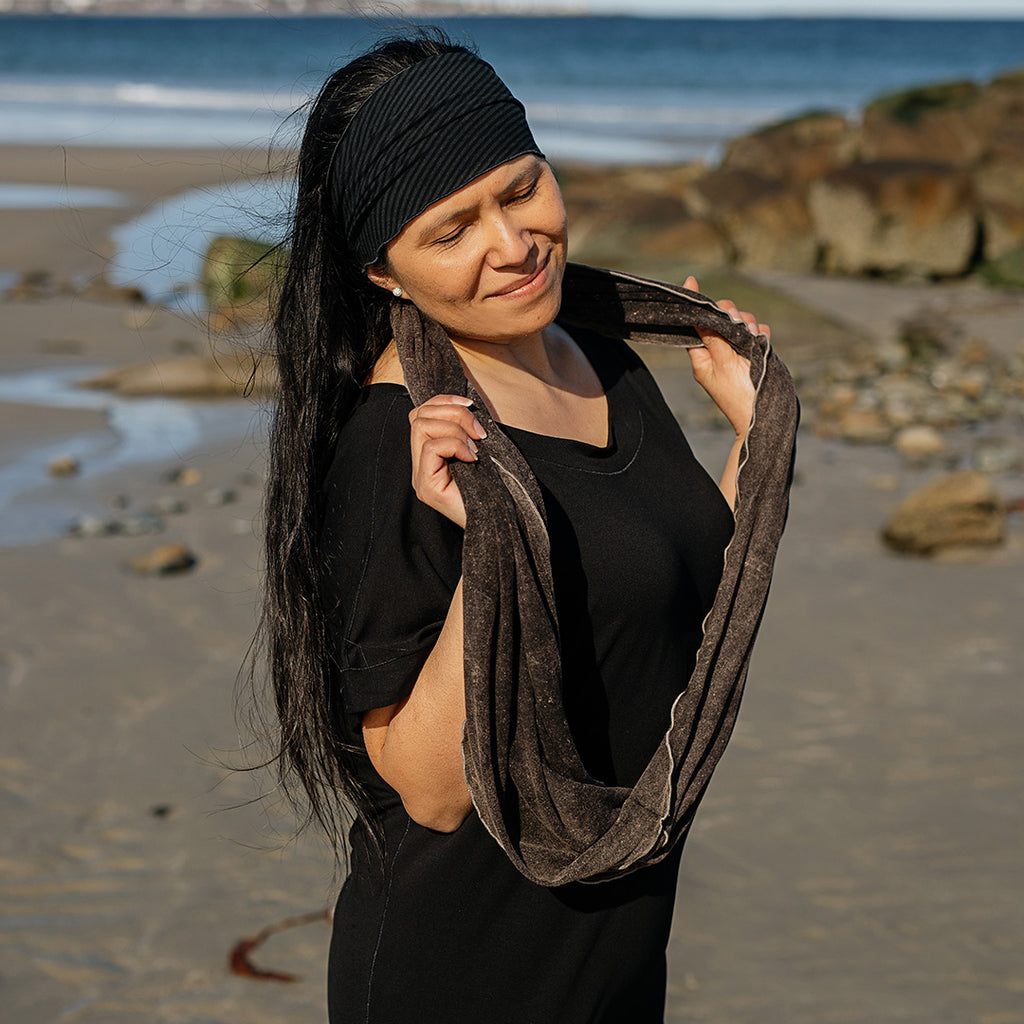 loop infinity scarf in mineral worn with flash top in black and band in subtle black worn as a headband