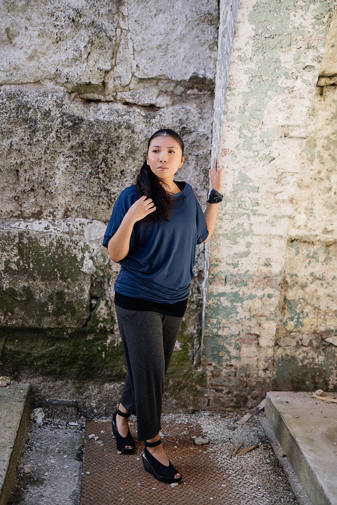 kick yoga pant in charcoal paired with flash top in navy