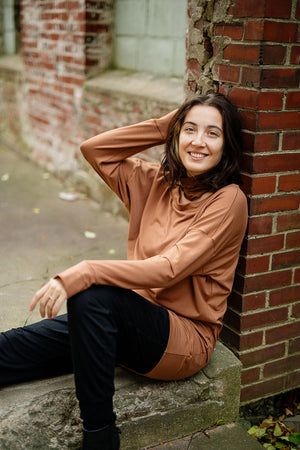 terry welder pullover in cedar with jogger in black and almond band around neck