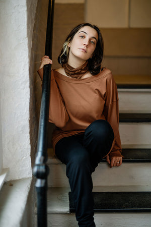 terry welder pullover in cedar with black jogger and almond band around neck