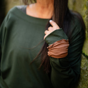 the band in cedar on the wrist with welder top in fir