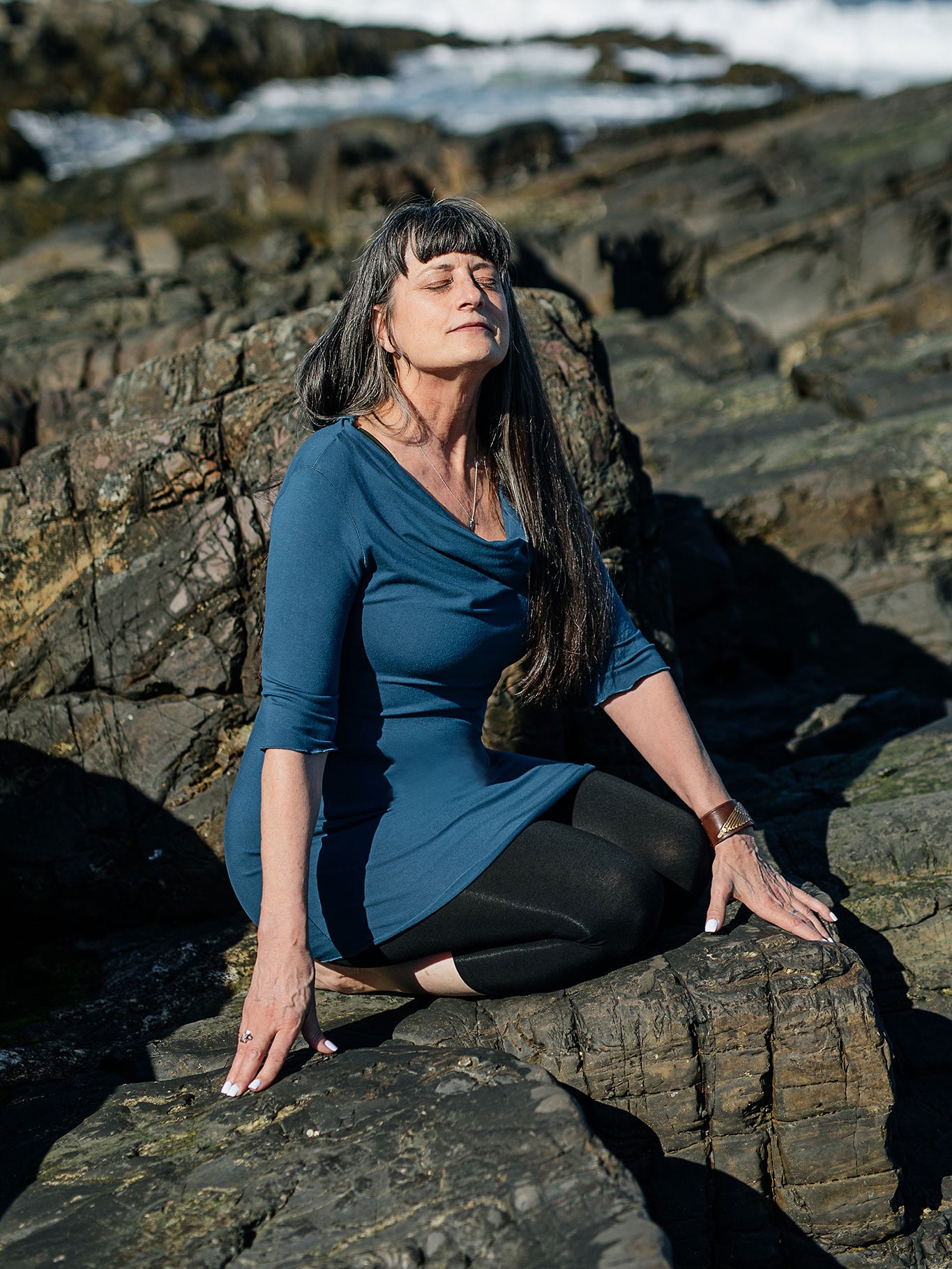 grace cowl neck half sleeve top in lake paired with black capri