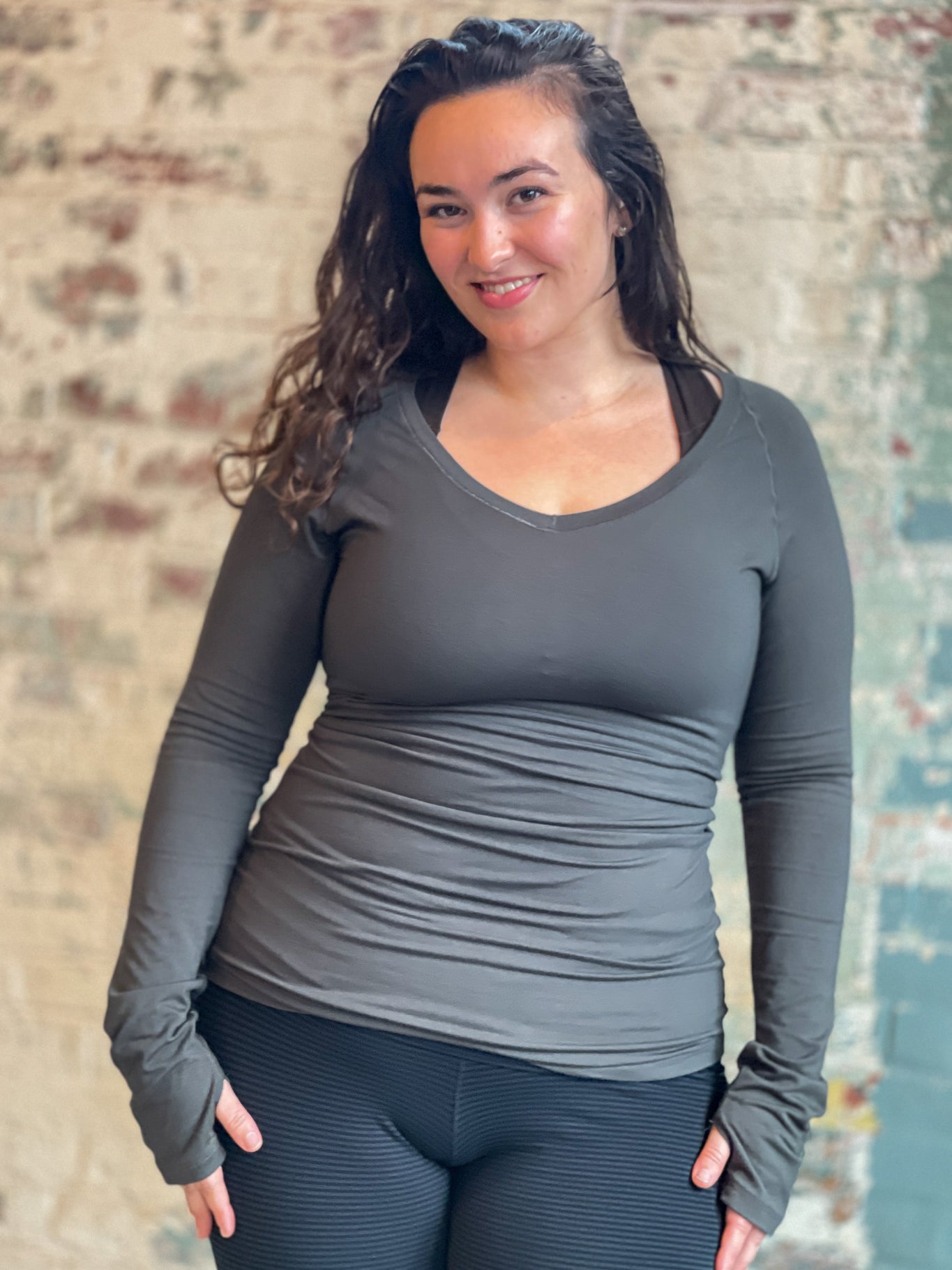 bamboo fir vneck long sleeve top with subtle black base leggings and balance bra