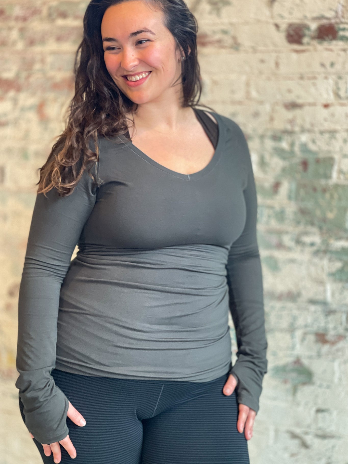 bamboo fir vneck long sleeve top with subtle black base leggings and balance bra