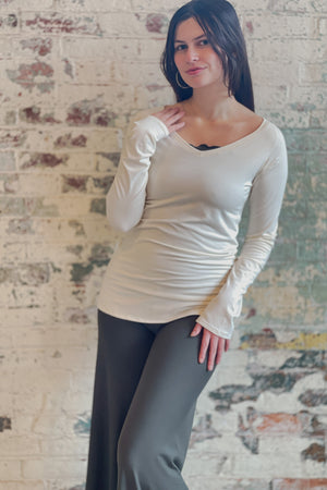 bamboo milk vneck long sleeve top with fir swirlsuit on bottom