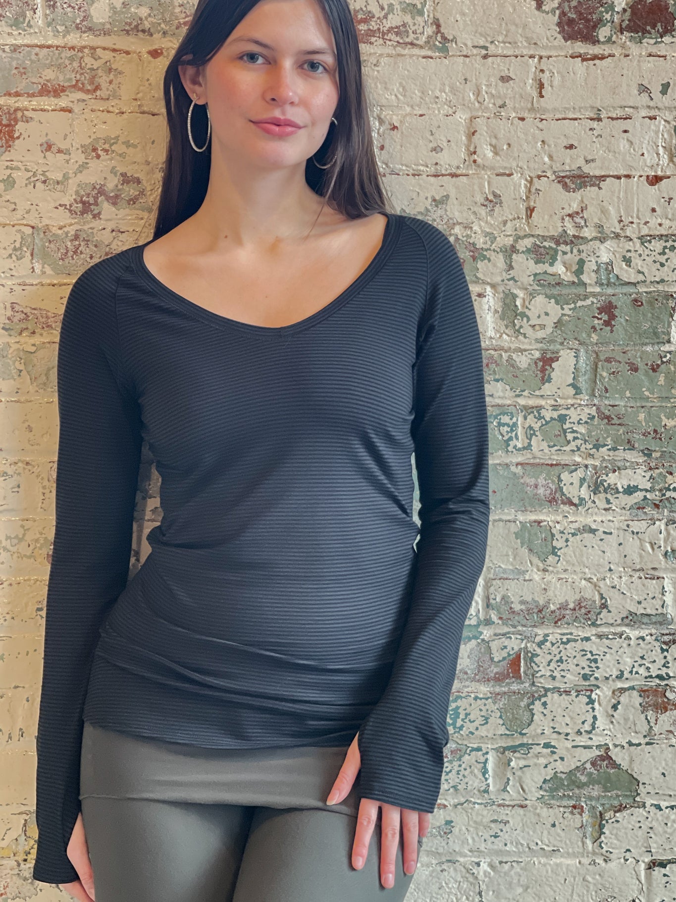 bamboo subtle black vneck long sleeve top with fir swirlsuit on bottom