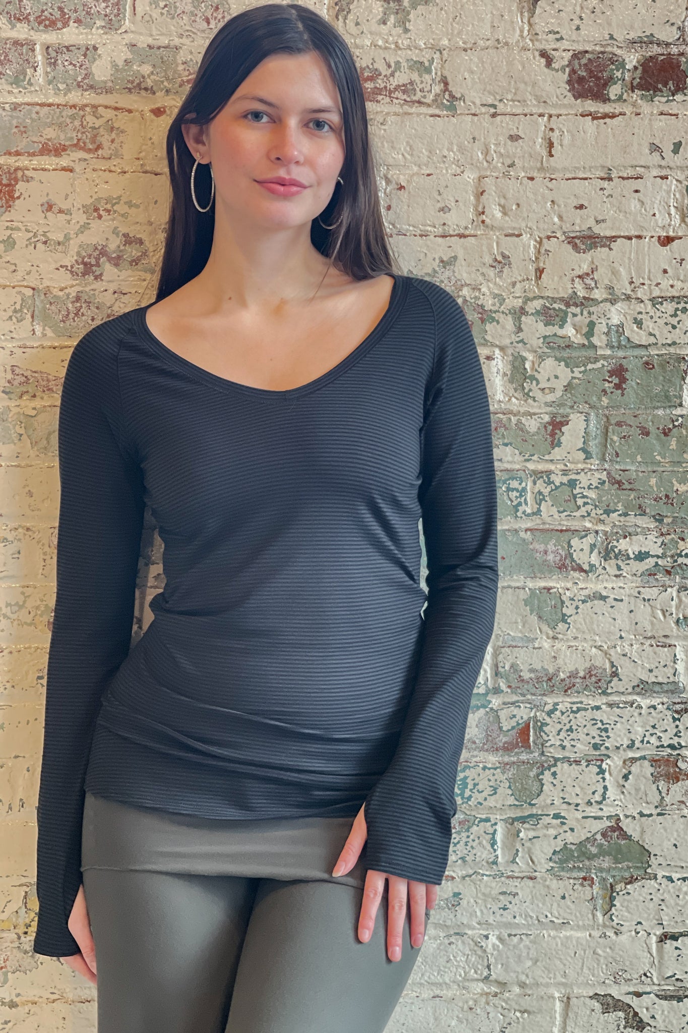 bamboo subtle black vneck long sleeve top with fir swirlsuit on bottom