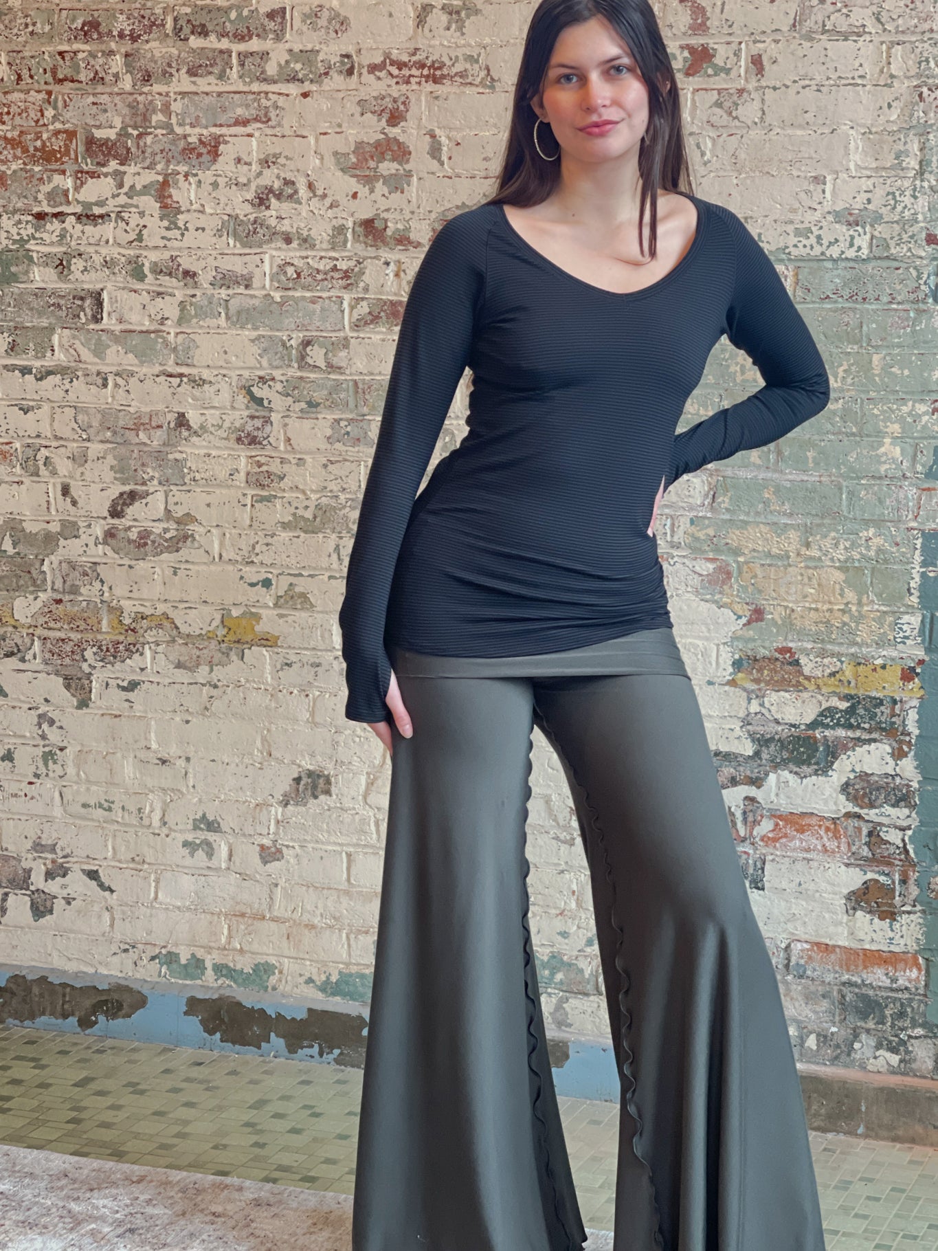 bamboo subtle black vneck long sleeve top with fir swirlsuit on bottom