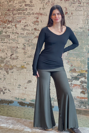 bamboo subtle black vneck long sleeve top with fir swirlsuit on bottom