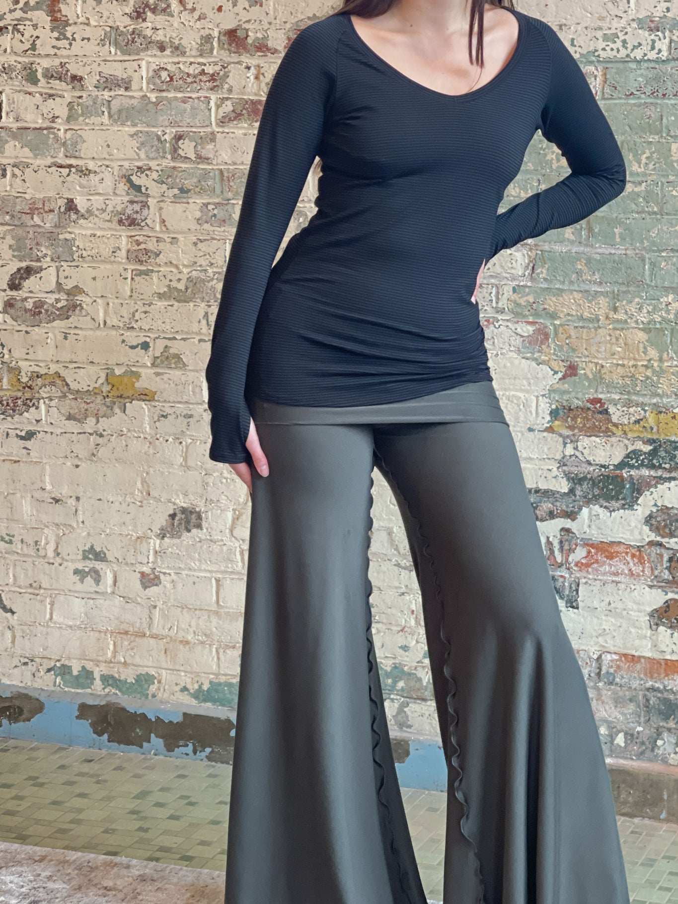 bamboo subtle black vneck long sleeve top with fir swirlsuit on bottom