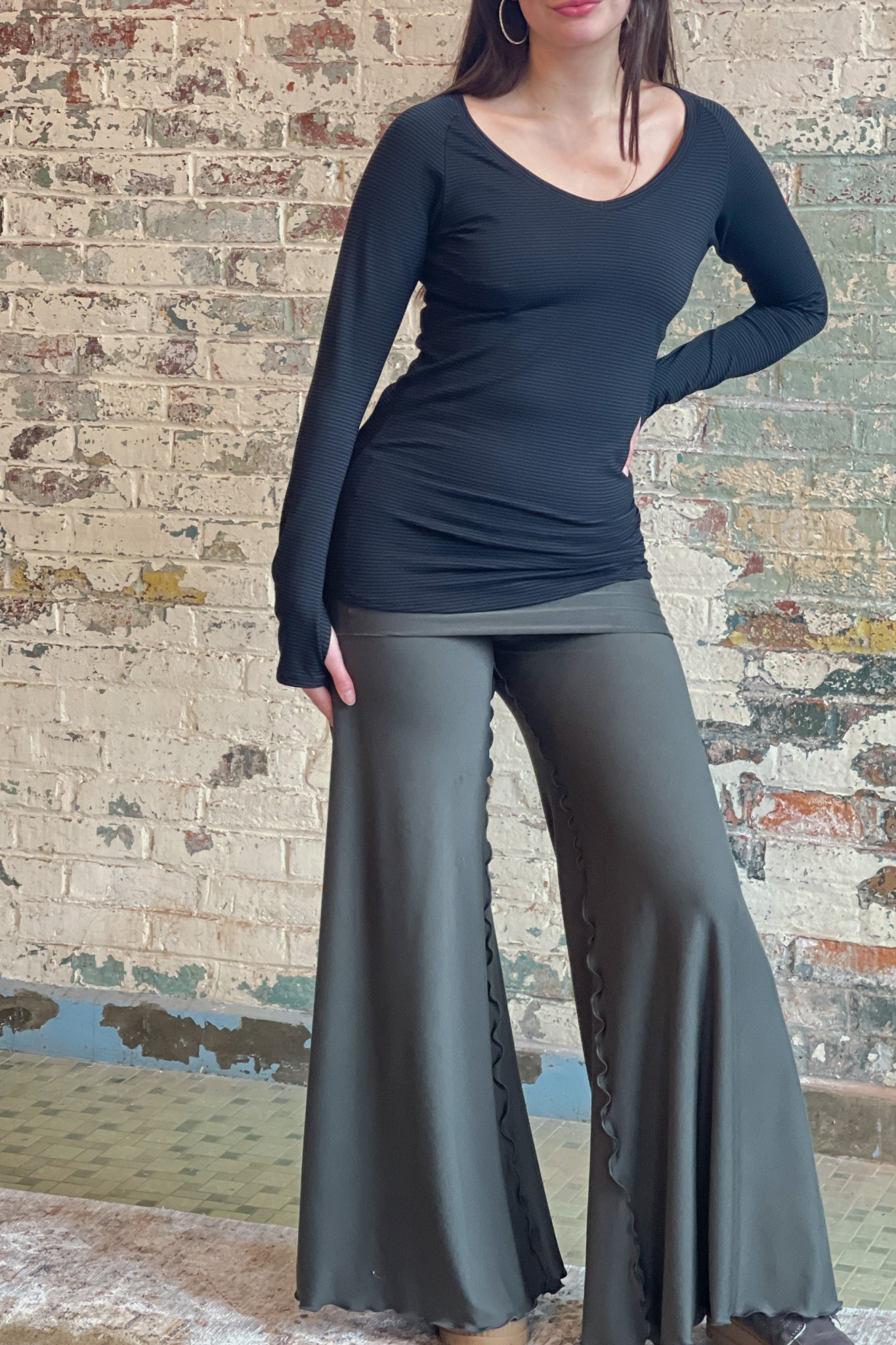 bamboo subtle black vneck long sleeve top with fir swirlsuit on bottom