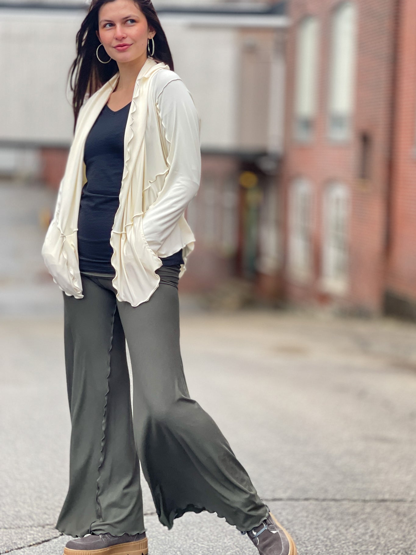 suger® swirlsuit in fir + subtle black vneck + milk cardi