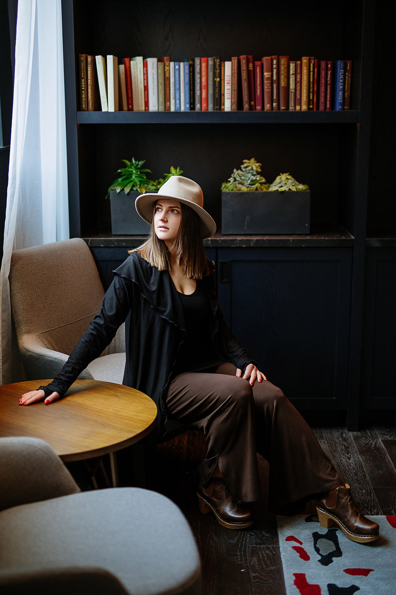 cardi in black over vital in black paired with harlow pant in peat