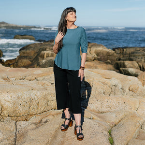 kick yoga pant in black styled with ocean rose top