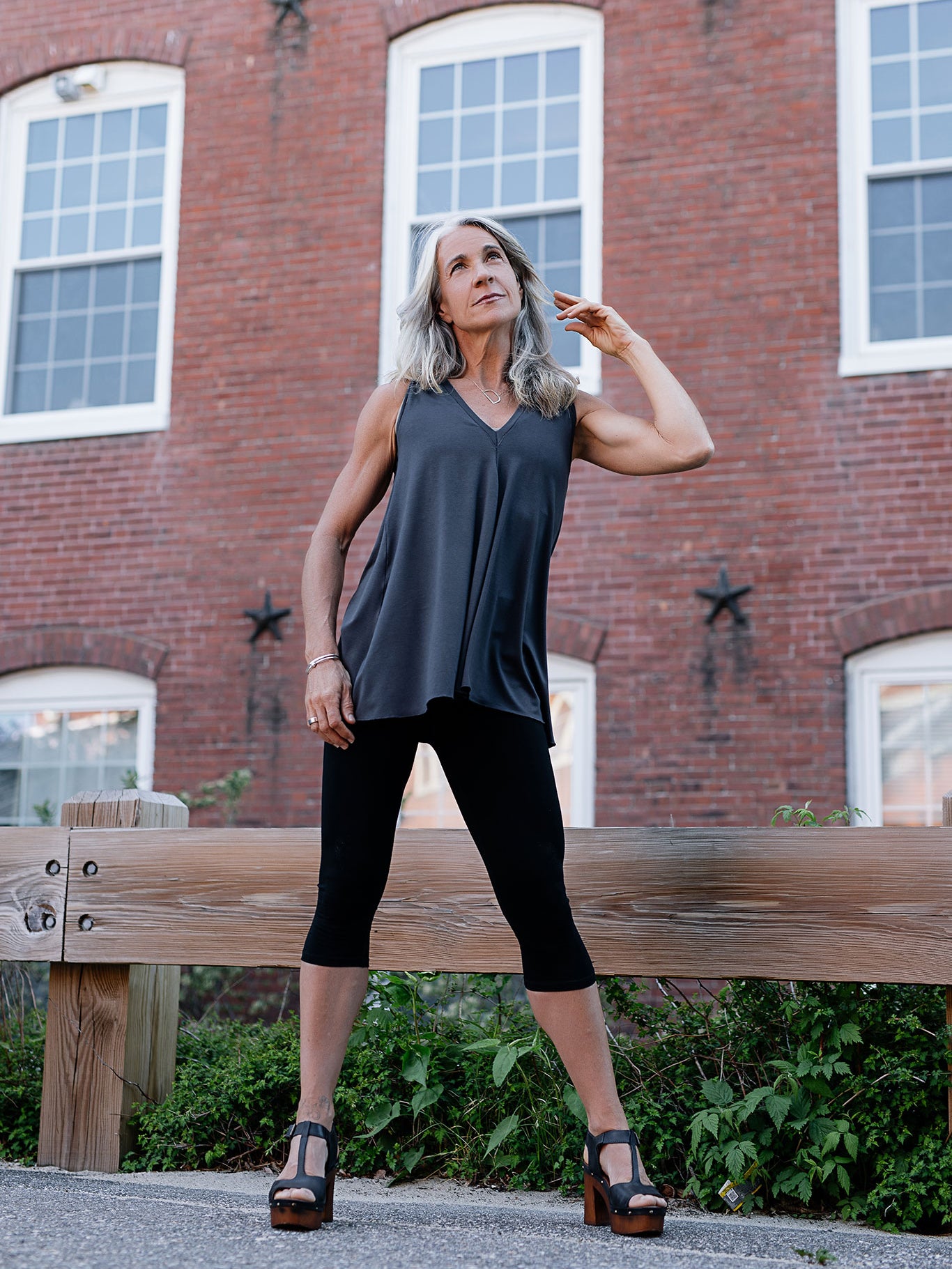 daisy tunic tank in carbon worn with black capri