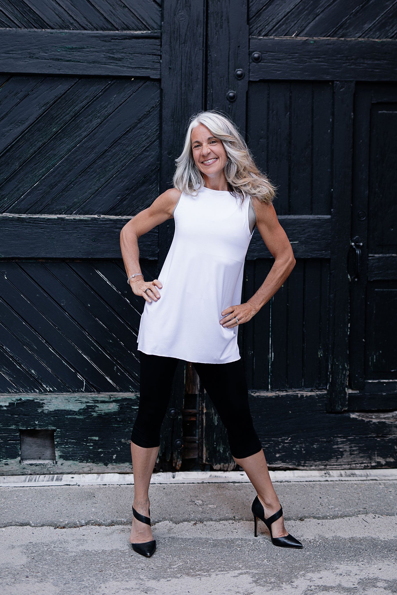 daisy tunic tank in white styled with black capri