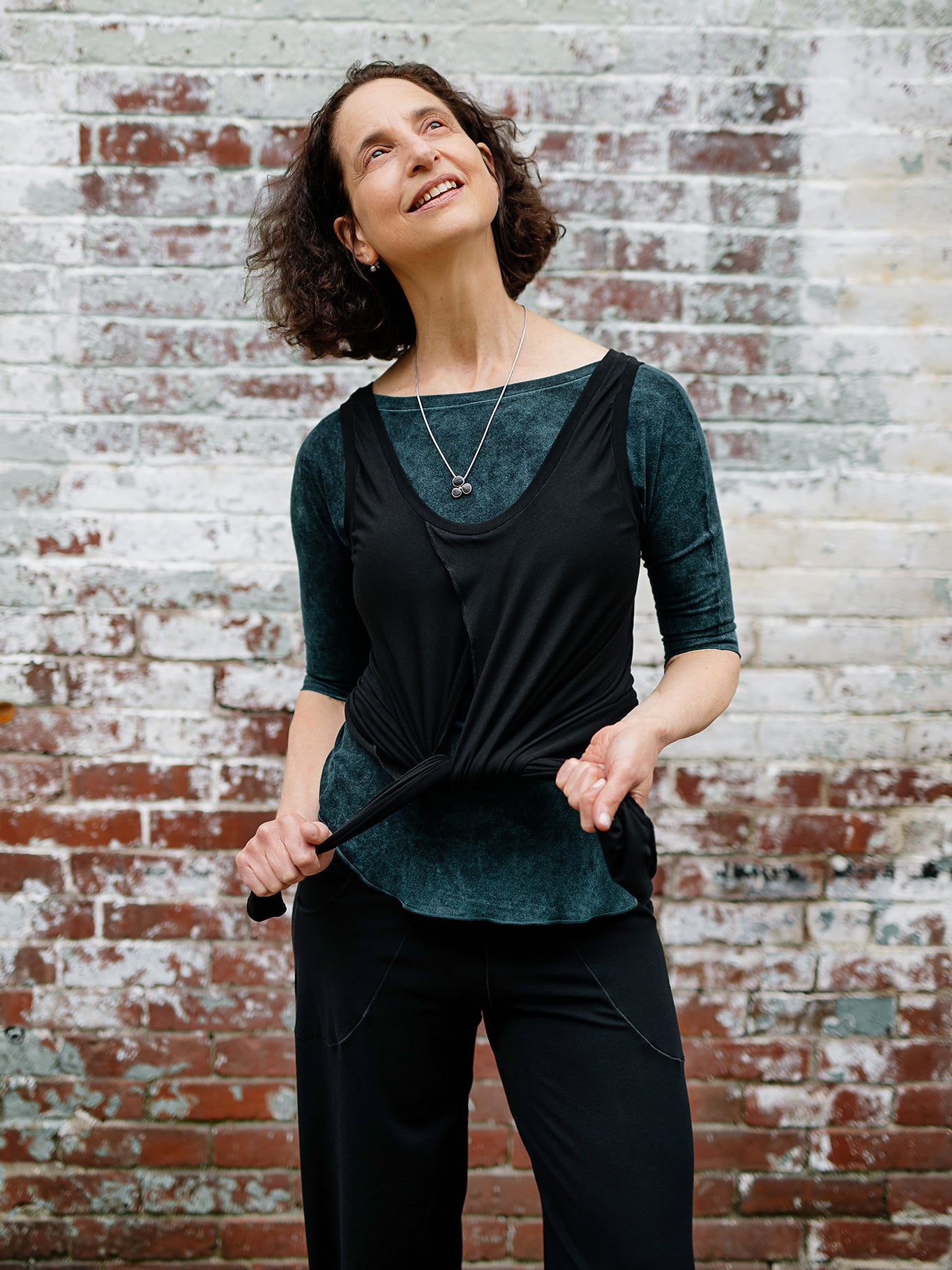 tulip tissue tank in black paired with blue mineral rose top