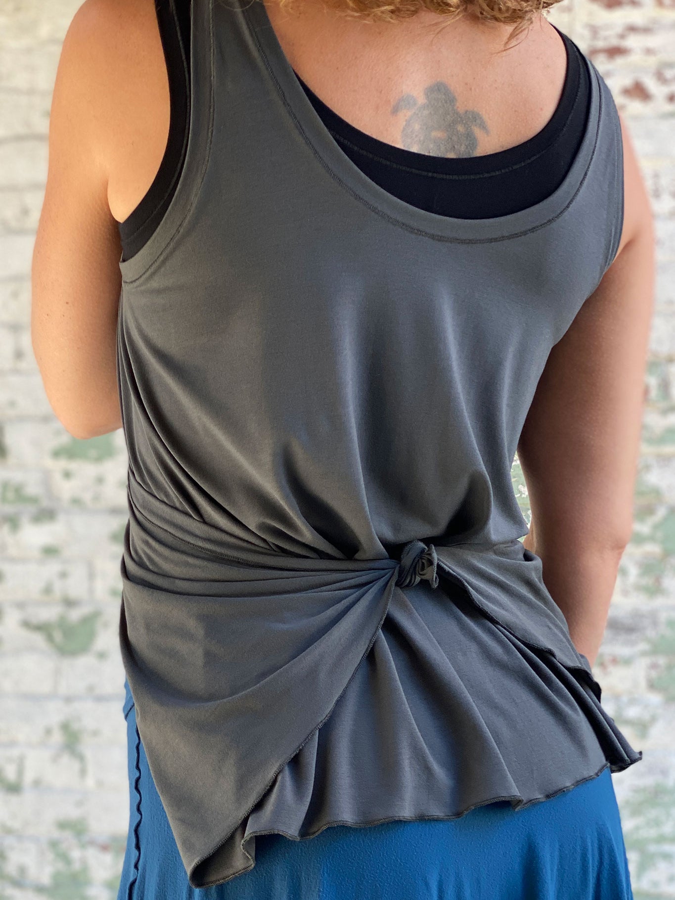 tulip in tissue ore tied in the back