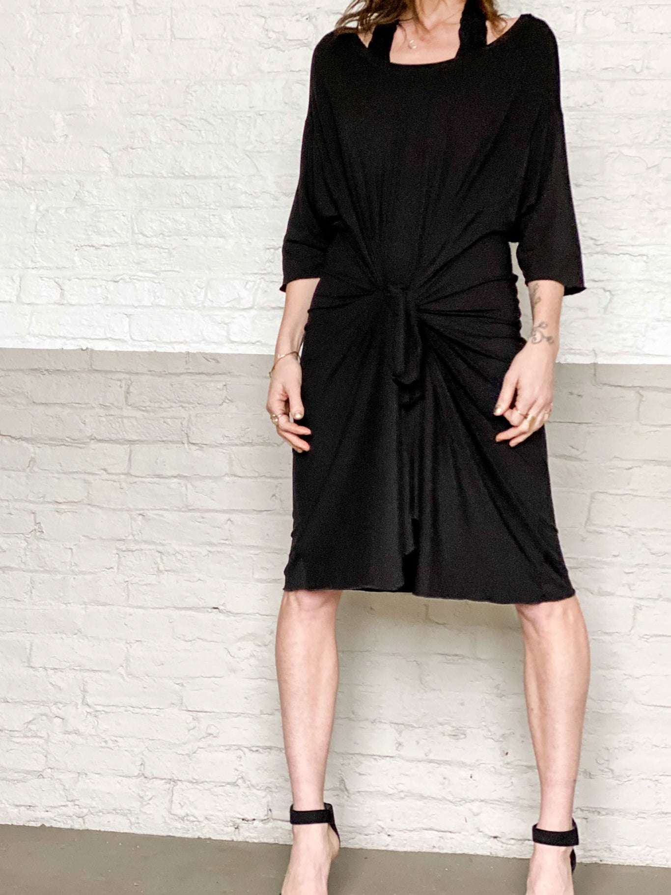 tide in tissue black with pockets tied in the front