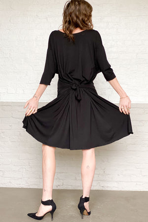 tide in tissue black with pockets tied in the back