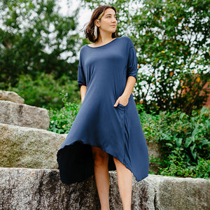 tide dress in navy has quarter length sleeves + deep pockets