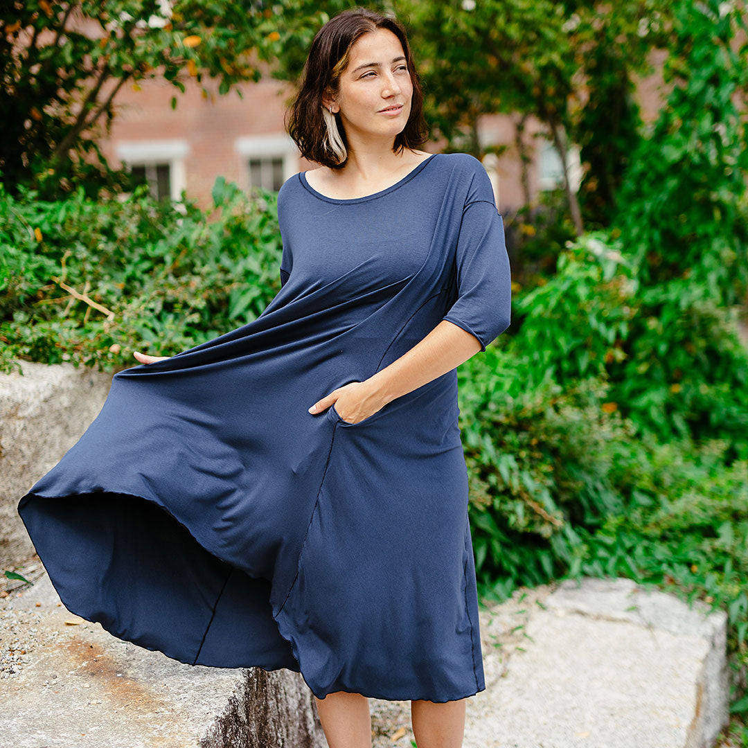 tide dress in navy has feminine flow 