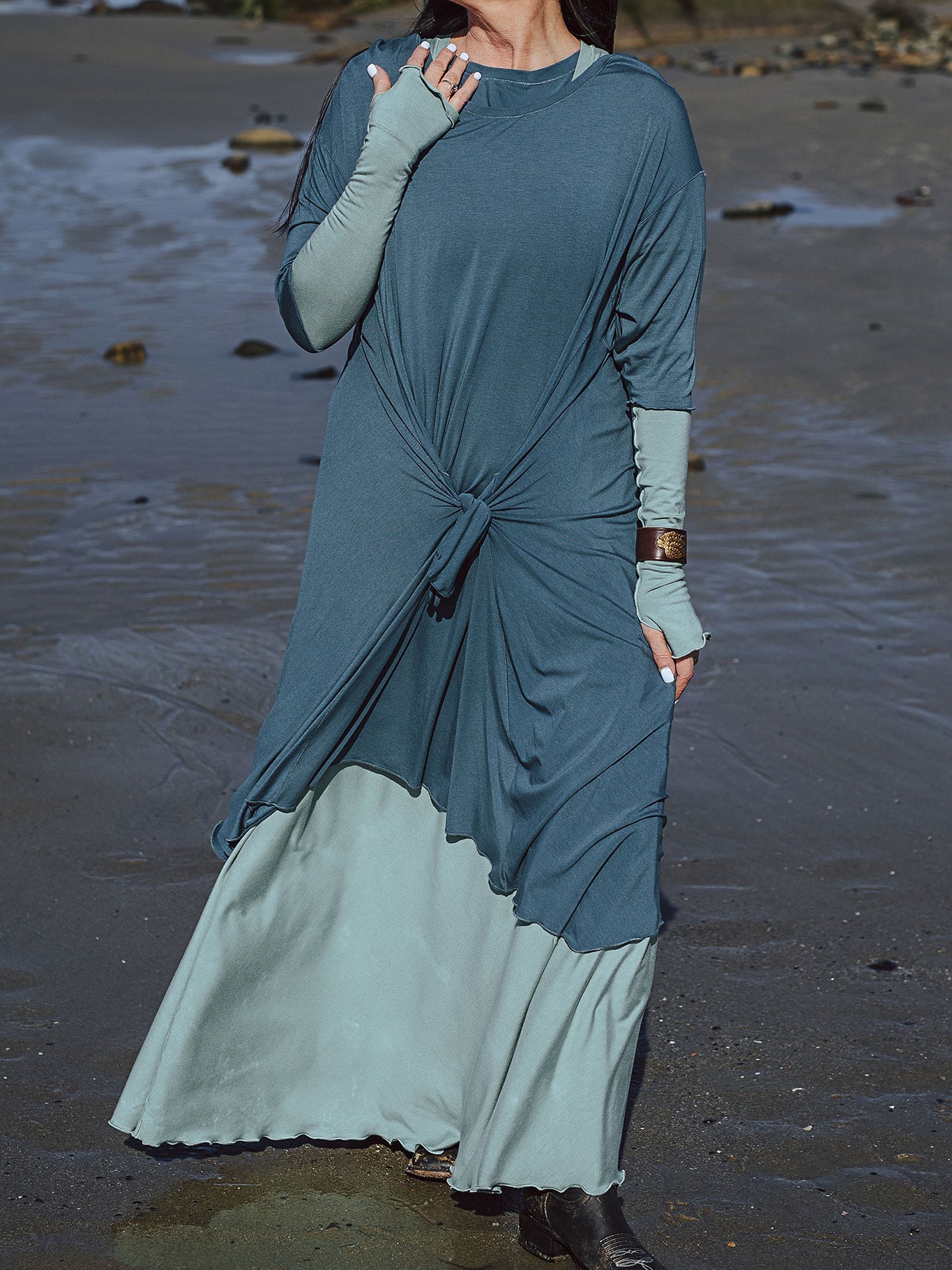 tide dress in ocean worn over glow gown in glass with glass opera sleeves