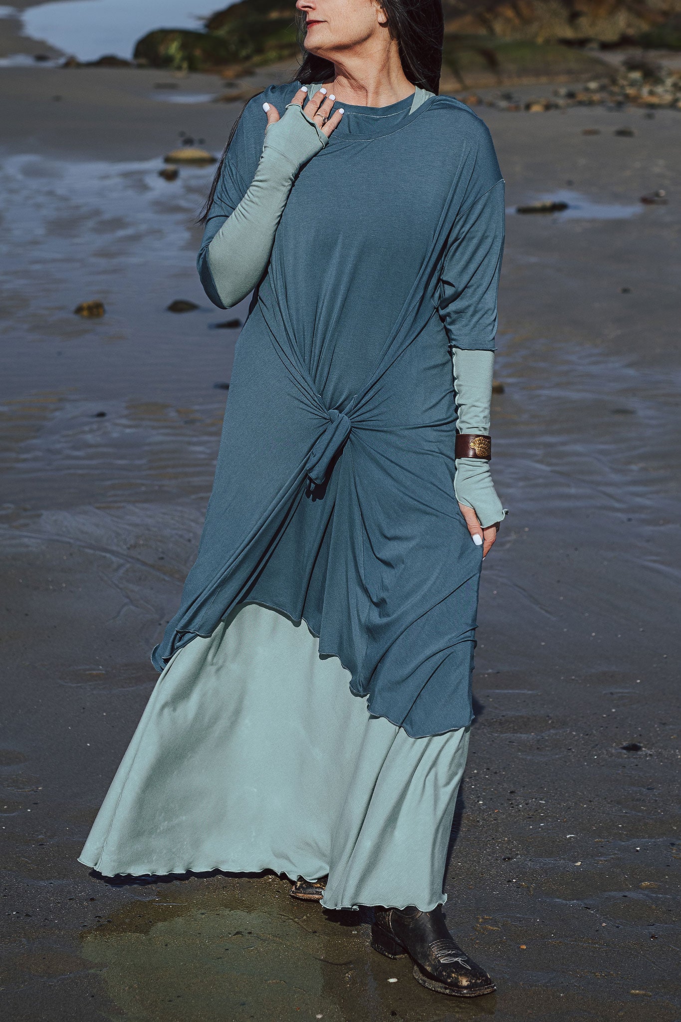 tide dress in ocean worn over glow gown in glass with glass opera sleeves