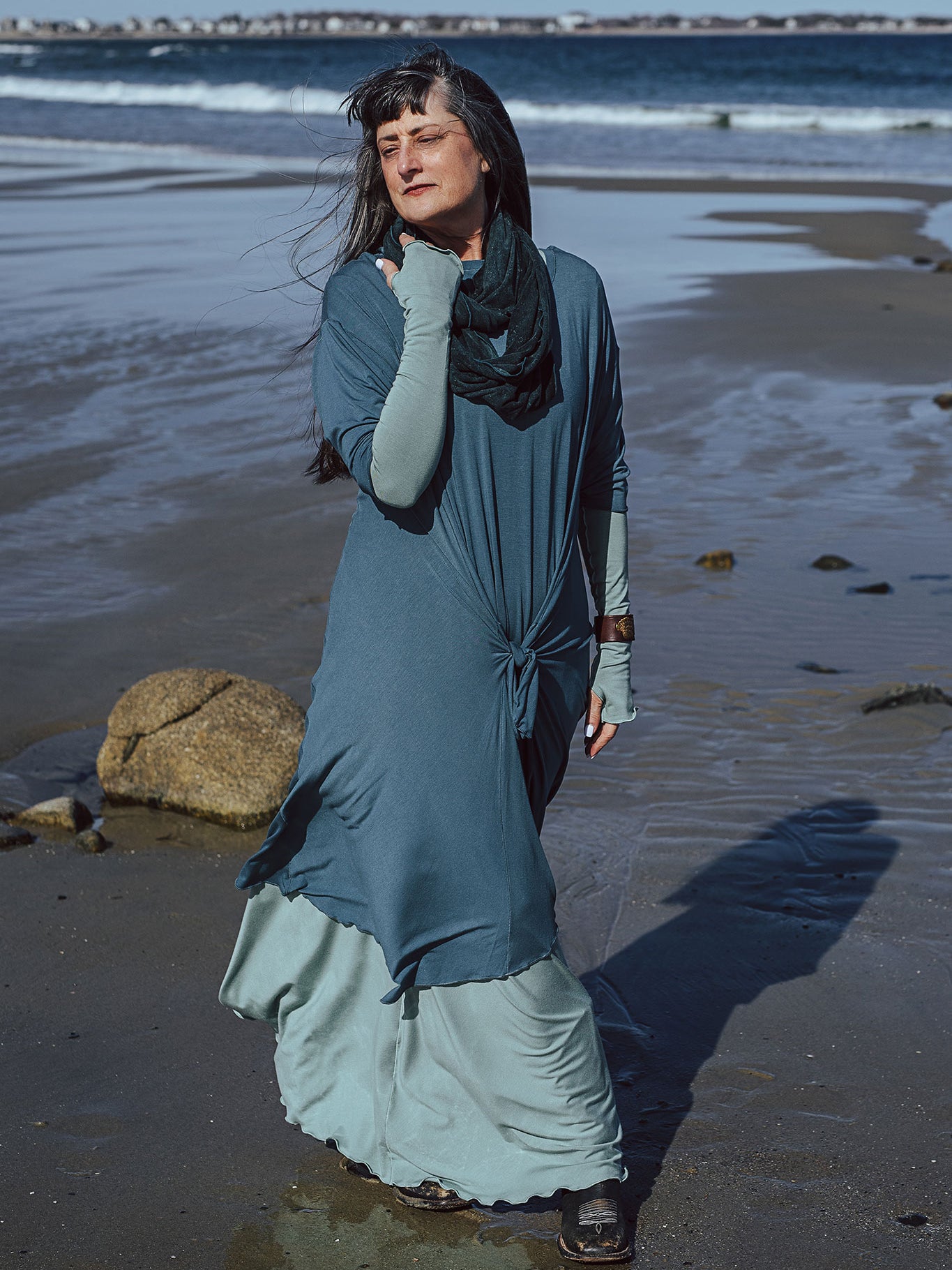 tide dress in ocean worn over glow gown in glass with glass opera sleeves and blue mineral loop