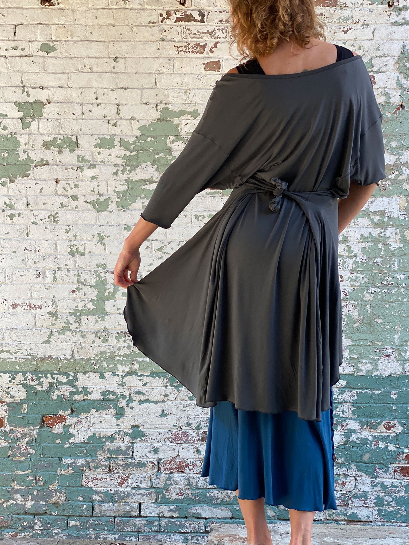 tide in tissue ore with pockets tied in the back