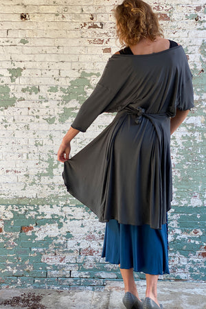 tide in tissue ore with pockets tied in the back