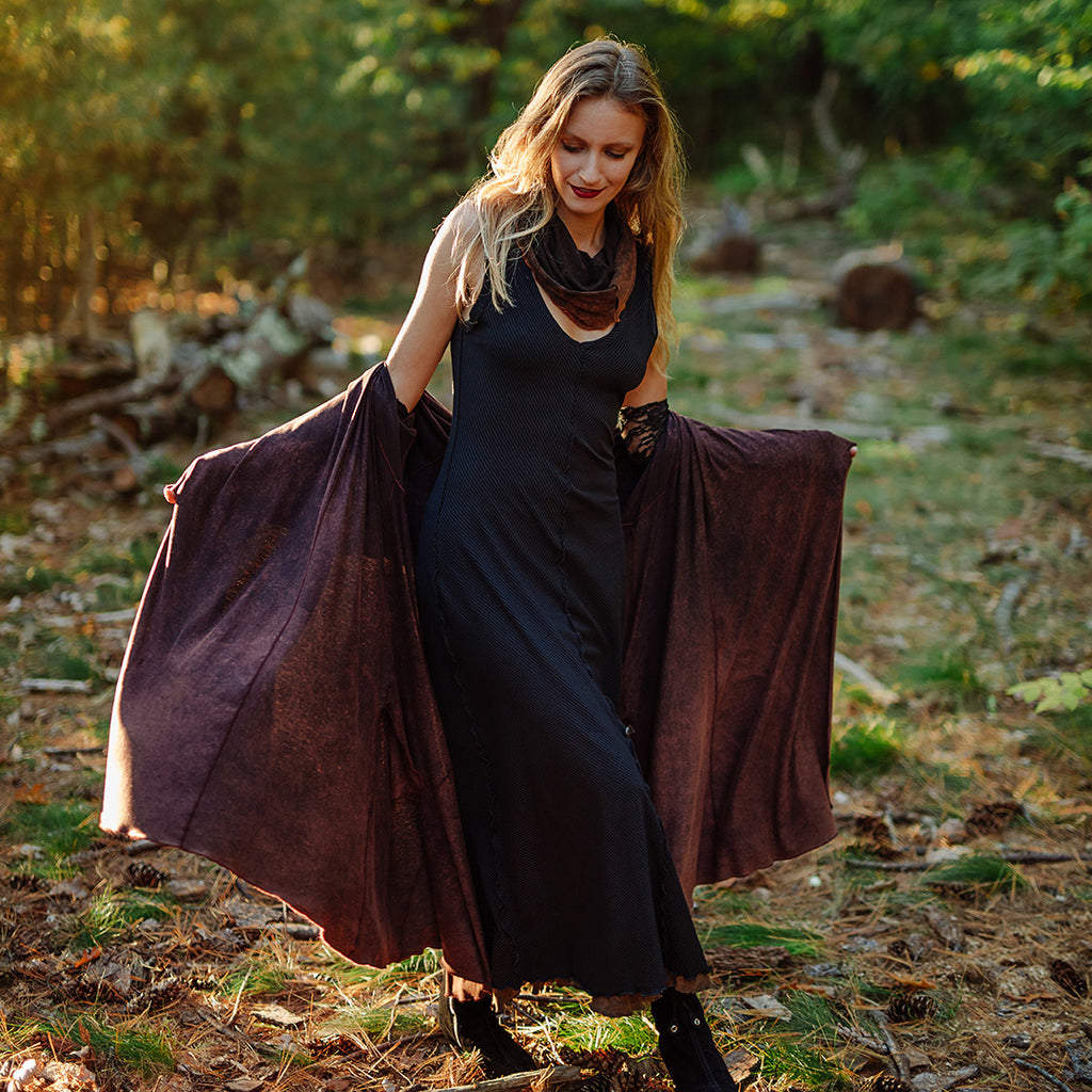 goddess dress in subtle black with garden coat in lush mineral