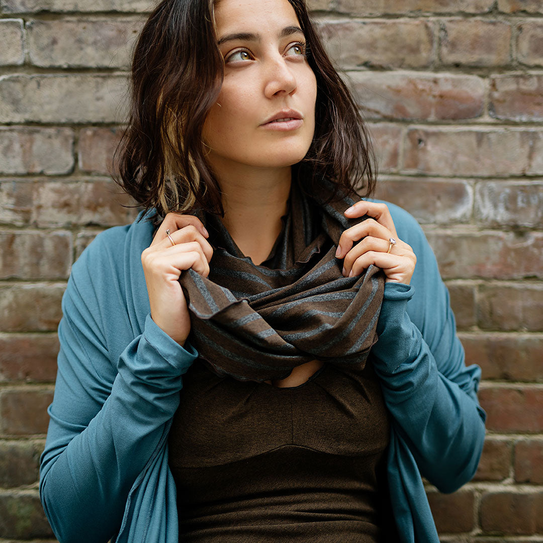 woodland loop scarf shawl paired with an ocean garden coat over an espresso reversible pushup dress