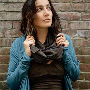 woodland loop scarf shawl paired with an ocean garden coat over an espresso reversible pushup dress