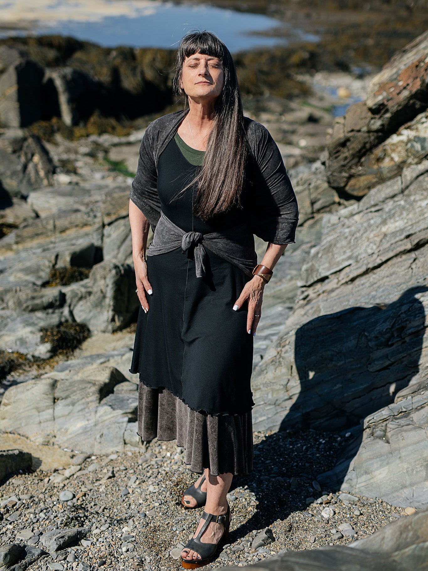 angelrox® flare vneck dress in black styled over mineral flirt with mineral shawl on top