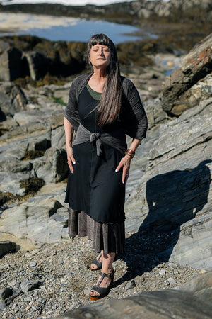 angelrox® flare vneck dress in black styled over mineral flirt with mineral shawl on top