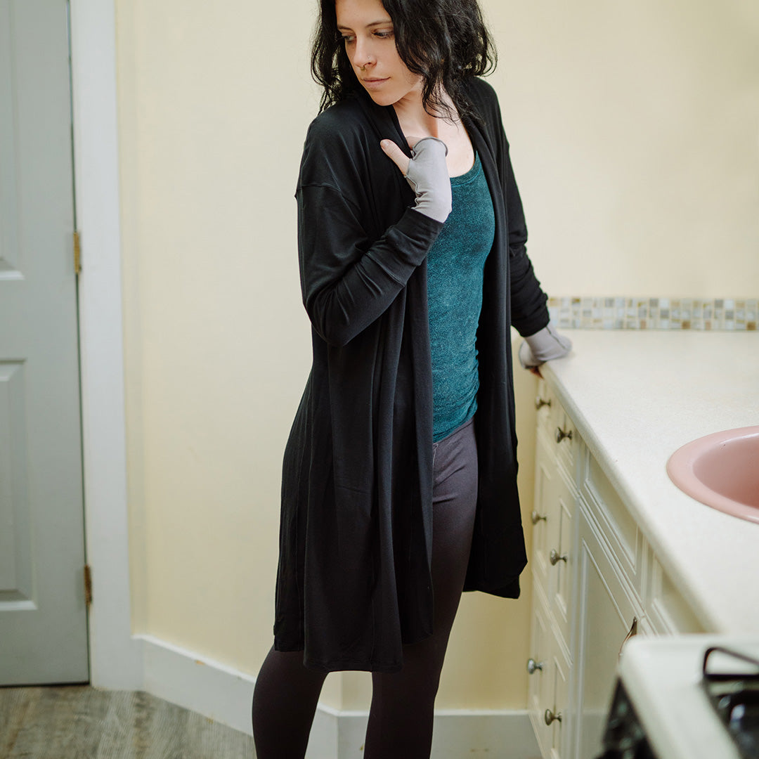 coco blazer in black paired with blue mineral core tank and carbon base legging