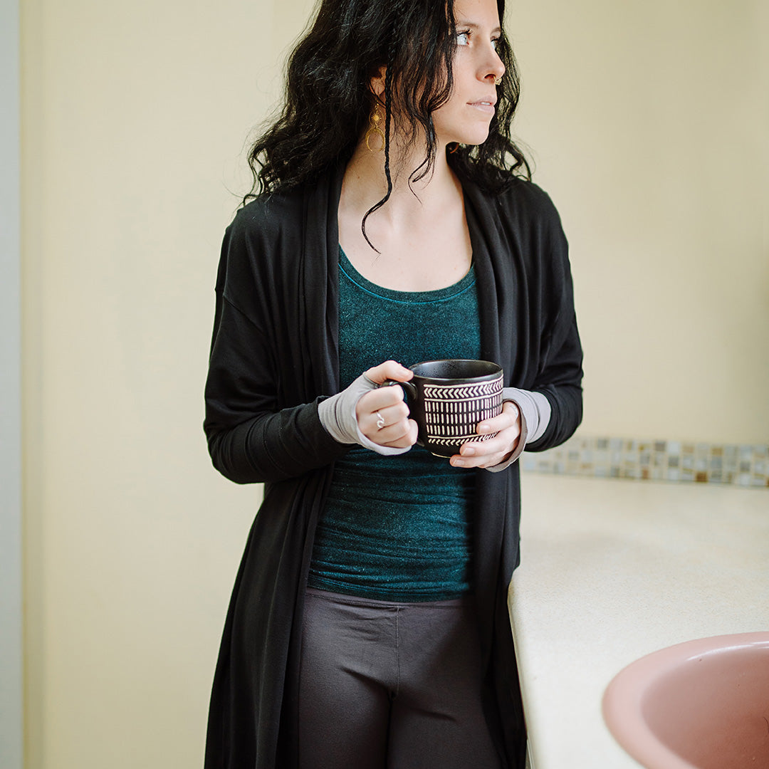 core tank in blue mineral with coco jacket in black and base legging in carbon