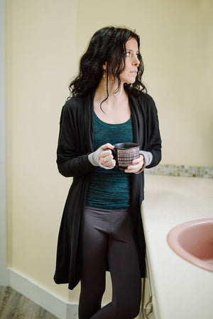 core tank in blue mineral with coco jacket in black and carbon base legging