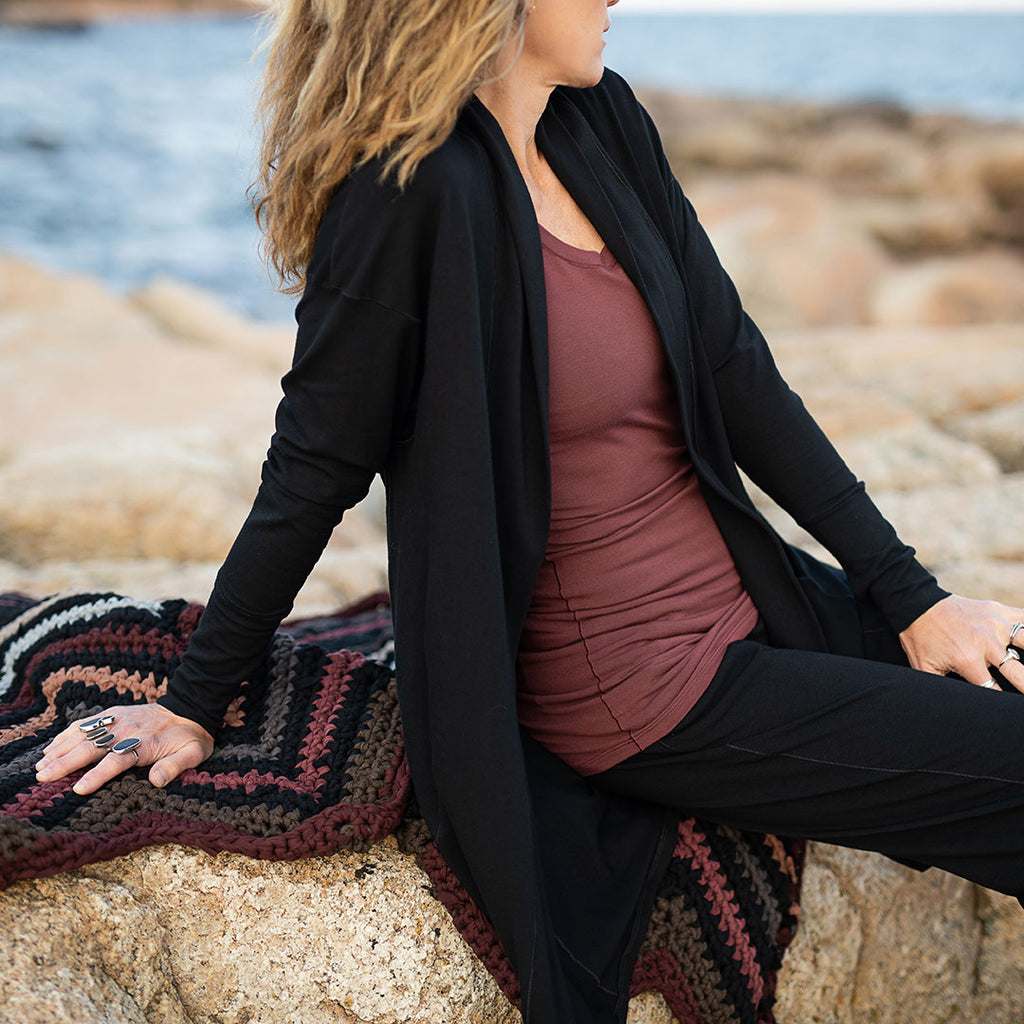 coco blazer in black, core tank in lush, jogger in black, reiki weighted blanket