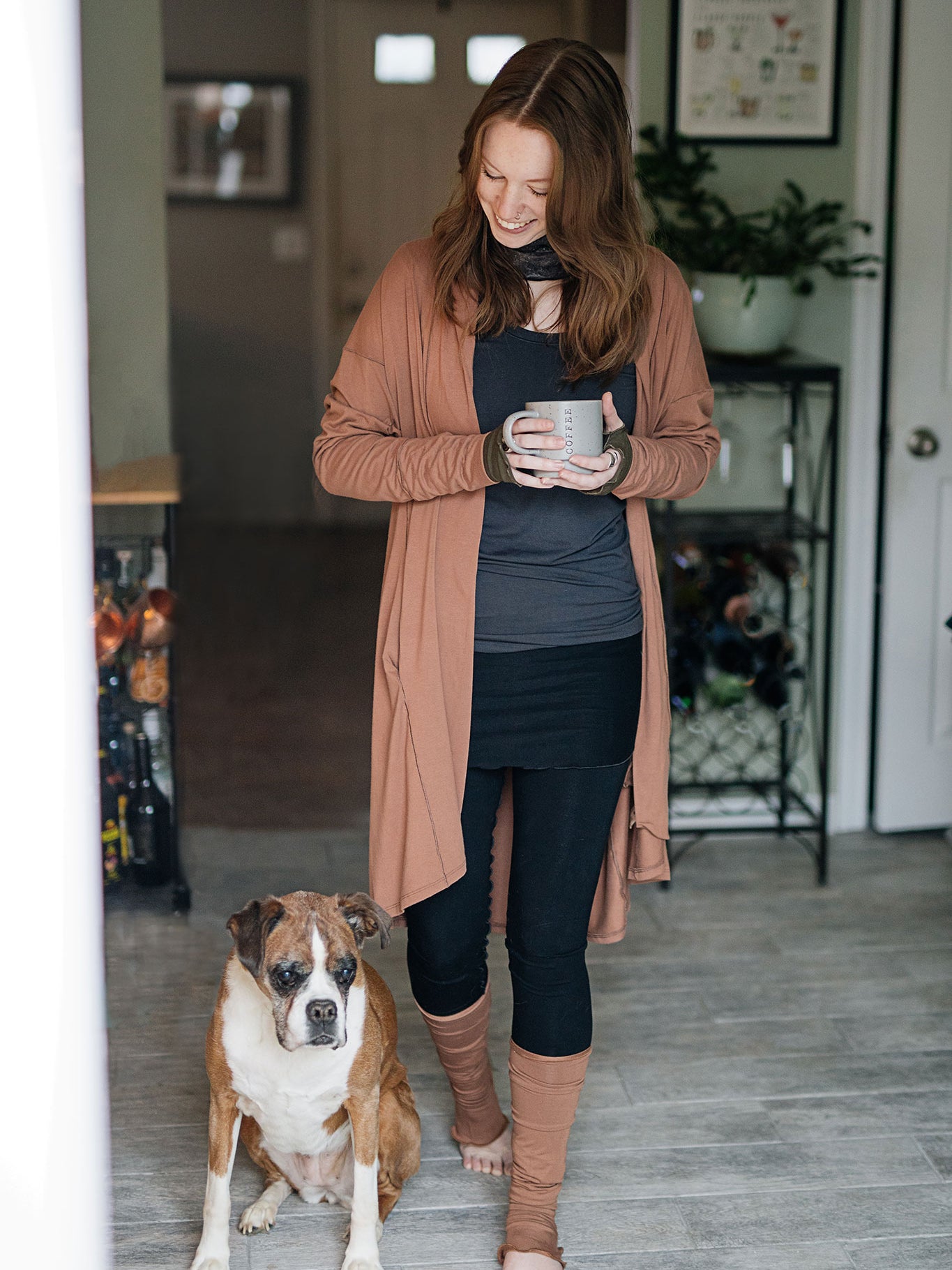 playsuit in black with top section folded over into a skirt; paired with coco jacket in cedar, cedar stockings, and core tank in carbon