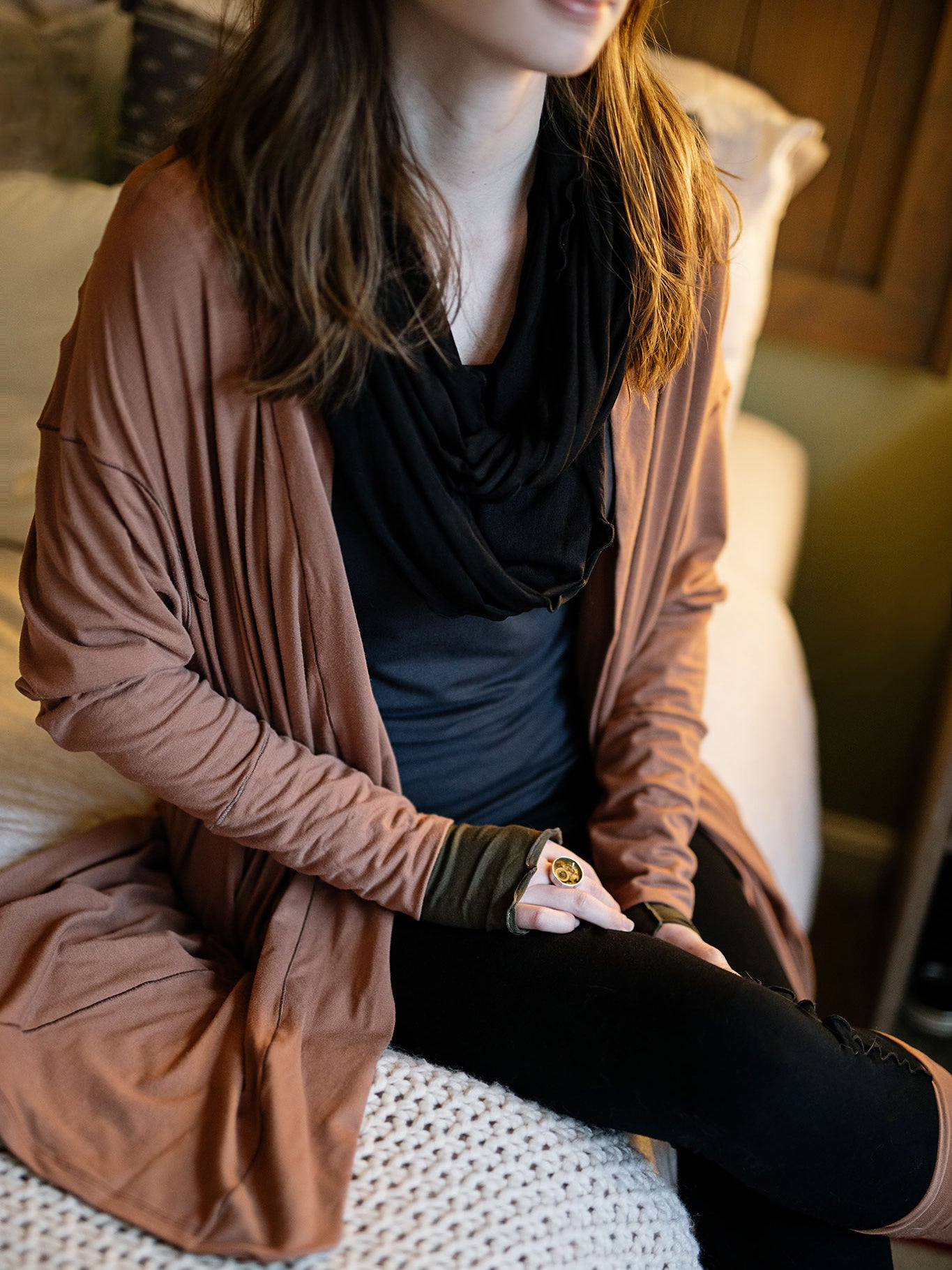 coco blazer in cedar paired with black playsuit, carbon core tank, and black loop around neck