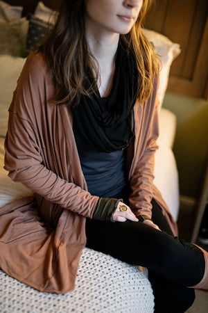 coco blazer in cedar paired with black playsuit, carbon core tank, and black loop around neck