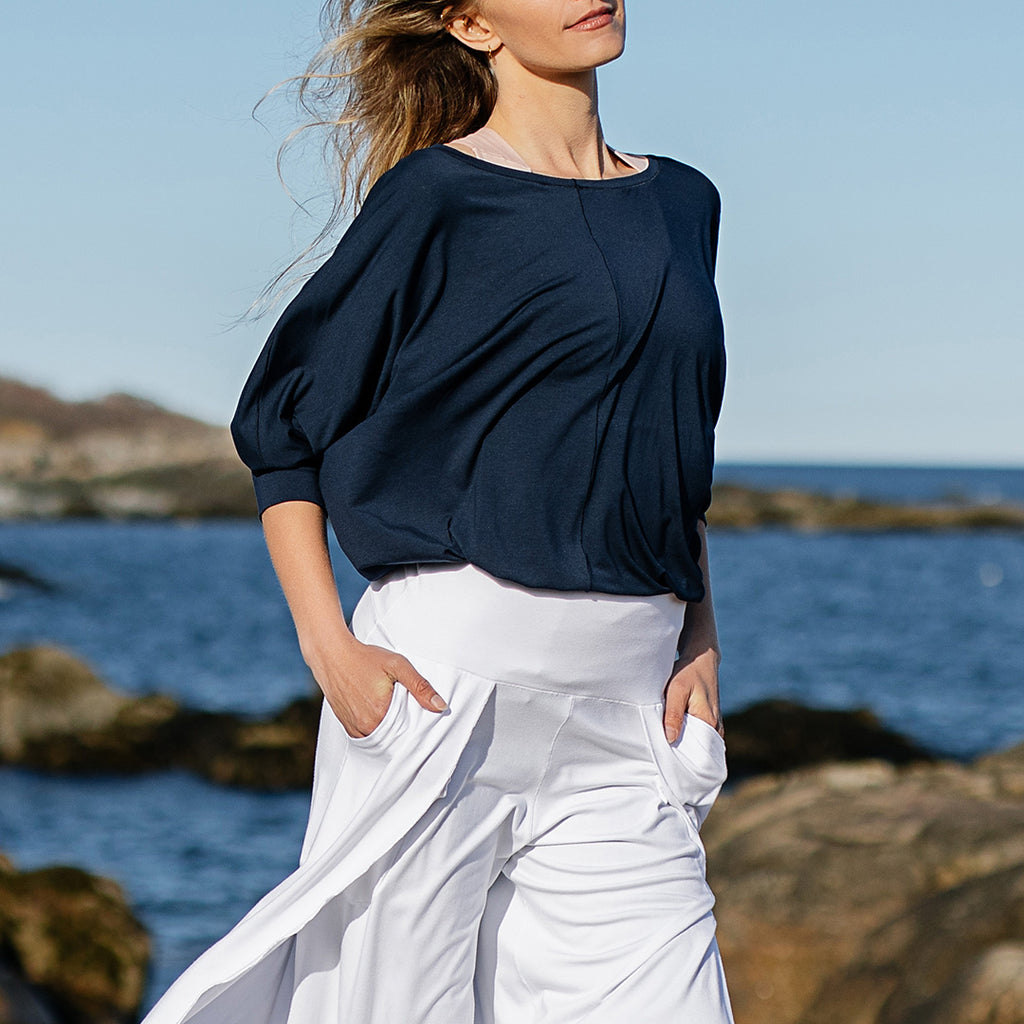 pop top in navy styled with white petal pants