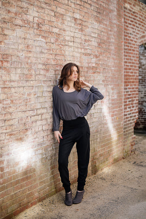 jogger in black with pop top in carbon tucked into waistband